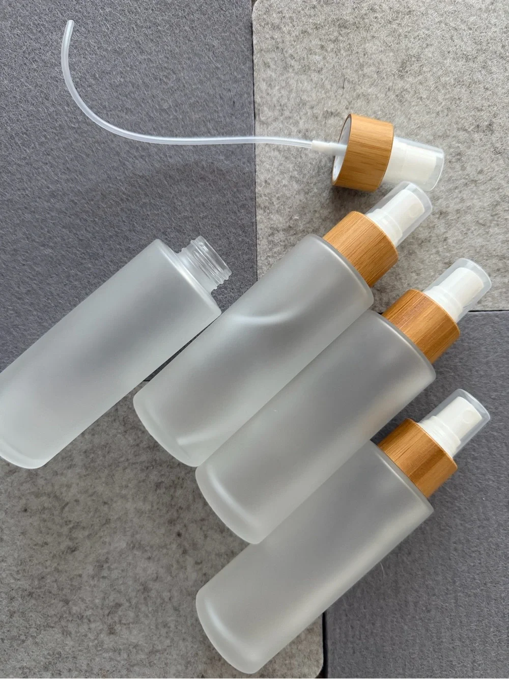 Frosted 100ml Glass Spray Bottle with Bamboo Pump - Clear/Beige set of 4